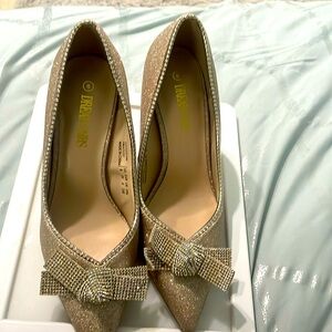 Gold sparkling heels